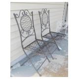 Pair of metal folding patio chairs