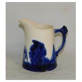 Antique Sleepy Eye stoneware crock pitcher,