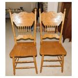 2 oak pressed back dining chairs