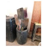 Long handled tools in a poly tub barrel