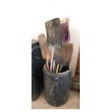 Long handled tools in a poly tub barrel
