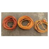 3 orange heavy-duty electric extension cords in 5