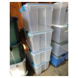 Four 54 quart Sterilite gasket lid storage boxes
