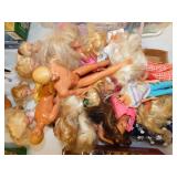 Twelve 1980's Barbie and 3 Ken dolls