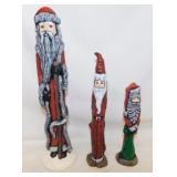 3 hand painted ceramic slender Santa Claus',