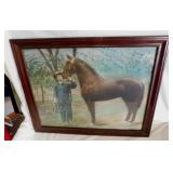 Antique color tinted photograph of man w/ horse