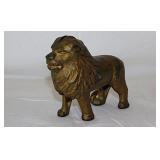 Antique cast iron lion coin bank, 5' long