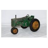 1950's John Deere Model A toy tractor, 8' long