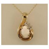 10K yellow gold opal & diamond pendant on