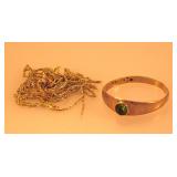 10K yellow gold baby ring w/ green stone -