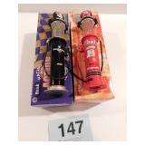 Two miniature glass top gas pumps - Dale