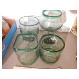 Four green glass hand blown glasses
