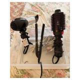 Clear Tote Containing Revlon Hair Styler