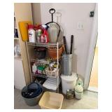 4- Tier White Rack Containing Variety of