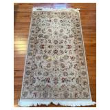 Appears to be a Safavieh Chelses Collection Hand