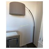 Crate and Barrel Tester Arc Floor Lamp in a Dark