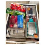 White Organizer Filled with Scissors, Foot Rasp