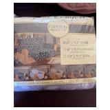 2 Laundry Baskets Full on Furniture Covers for