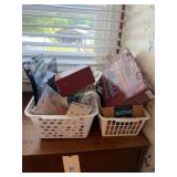 2 Baskets of Light Bulbs and Batteries