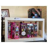 SHELF AND BARBIE DOLLS