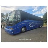 BUS (PURPLE)  1999  60 SERIES DETROIT TURBO...