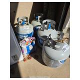 GROUP OF 4 PROPANE BOTTLE WITH PROPANE GROUP OF 4 PROPANE BOTTLE WITH PROPANE
