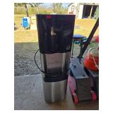 WATER JUG AND EXERCISE EQUIPMENT