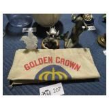 GOLDEN CROWN BAG AND MISC. FIGURINES