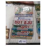 GROUP OF RAISED LETTER LICENSE PLATES