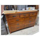 Wooden Nine-Drawer Dresser with Dark Metal Pulls