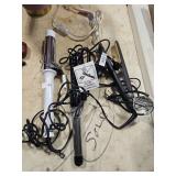 Two Curling Irons and One Flat Iron