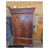 Traditional Wood Armoire with Oval Inlay Doors