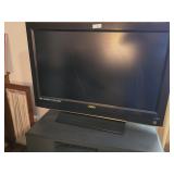 FLATSCREEN TV AND TABLE