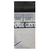 Pair of Vintage Contains Lead Fuel Signs