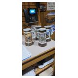 Set of Four Vintage Decorative Ceramic Beer Steins