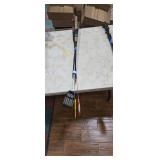 Set of Two Fishing Rods with Attached Accessories