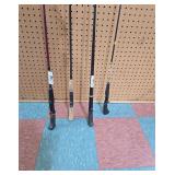 set of four assorted fishing rods