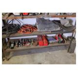 Contents of Bottom 2 Shelves: gas can, cables, etc