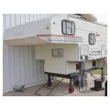 Camper on Heavy Duty Rolling Stand with a Weight