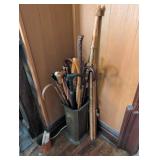Walking Sticks in Metal Umbrella Stand