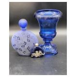 Three Blue Glass Decorative Items