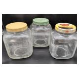 Three Clear Glass Jars with Metal Lids