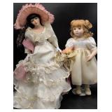 Two Porcelain Dolls in Formal Attire