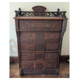 Carved Wood Tall Dresser with Decorative Trim