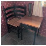Black Ladder-Back Chair, Wooden Table, and Metal V