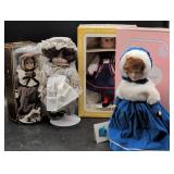 Four Porcelain Dolls with Boxes