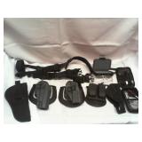 Assorted holsters and firearms items