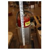 Fire extinguisher with wall mount