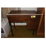 Sears Kenmore sewing machine in cabinet