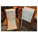 pair of wooden folding chairs